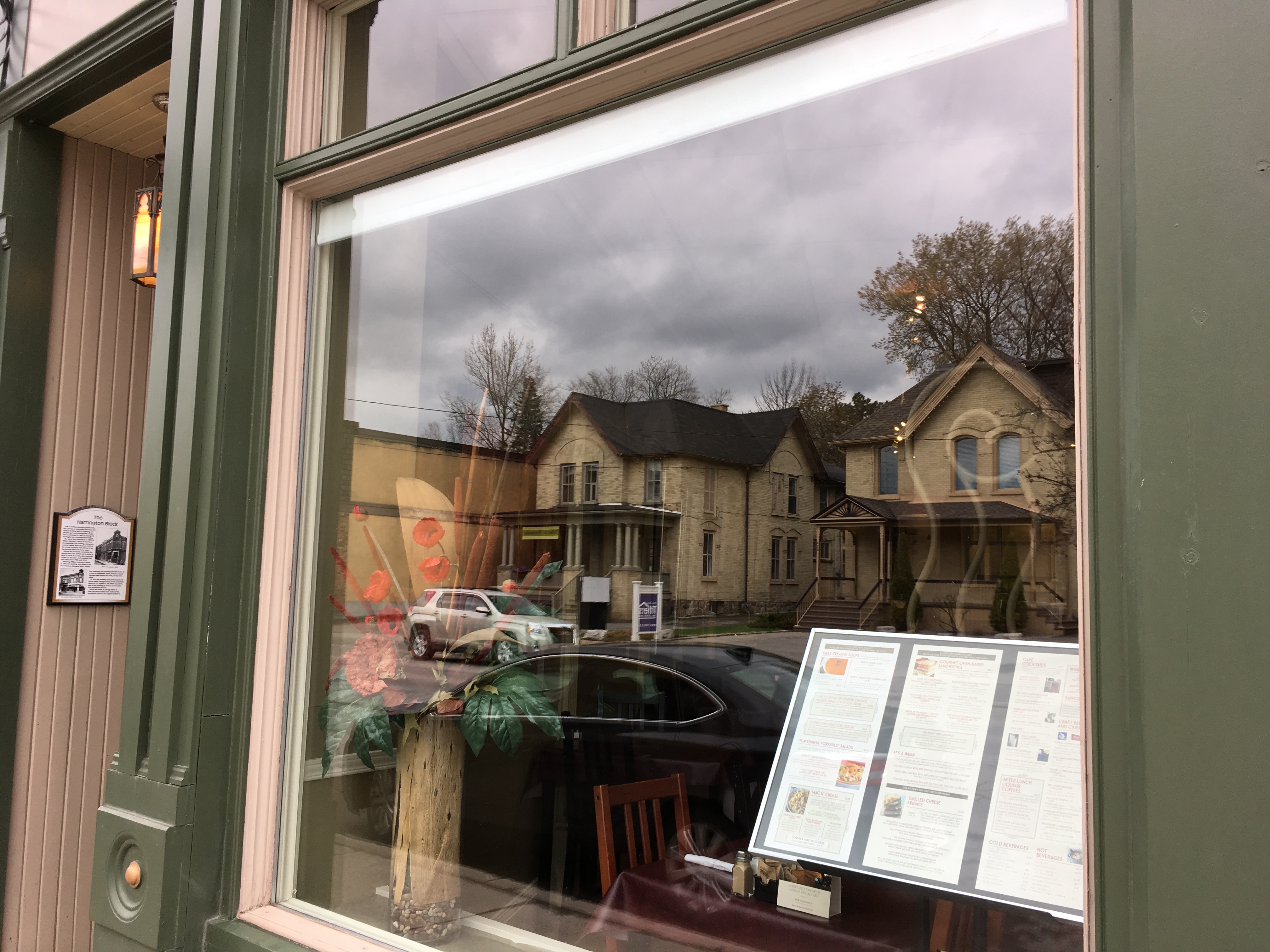Piano cafe menu through clean windows in port perry